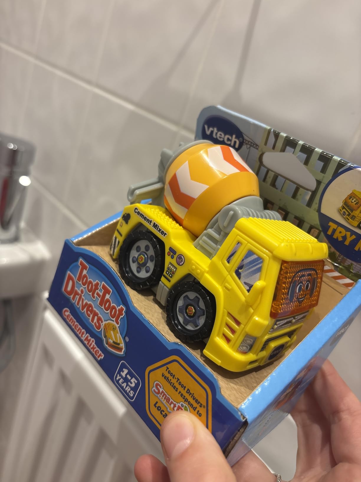 Child enjoying a VTech Toot Toot Drivers car and track - customer photo
