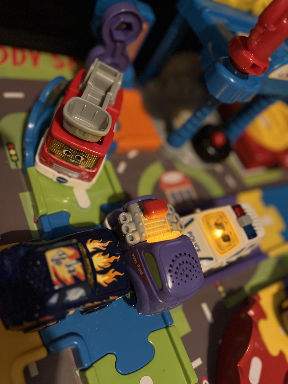 Toddler driving a VTech Toot Toot Drivers vehicle - customer photo